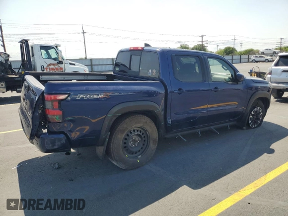 2022 Nissan Frontier Pro-X with VIN 1N6ED1EJ5NN610792, listed as a Copart auction lot 59897795 with 51,214 mi miles and Salvage title. Bid and sale history available at DreamBid. Image 3.