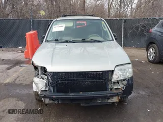 2005 Mercury Mariner Luxury z VIN 4M2YU57175DJ05986, wystawiony jako IAAI lot #41713180 z przebiegiem 243 682 mil mil oraz . Historia ofert i sprzedaży dostępna na DreamBid. Obrazek 12.