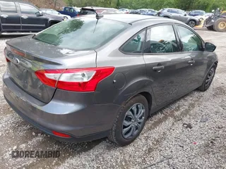 2012 Ford Focus SE with VIN 1FAHP3F29CL310052, listed as a IAAI auction lot 42671578 with 220,537 mi miles and . Bid and sale history available at DreamBid. Image 4.