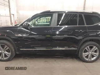 2018 Volkswagen Atlas SEL z VIN 1V2RR2CAXJC548261, wystawiony jako IAAI lot #41650478 z przebiegiem 123 399 mil mil oraz . Historia ofert i sprzedaży dostępna na DreamBid. Obrazek 15.