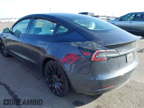 2021 Tesla Model 3 Performance with VIN 5YJ3E1EC3MF082532, listed as a IAAI auction lot 41757905 with 60,431 mi miles and . Bid and sale history available at DreamBid. Image 3.