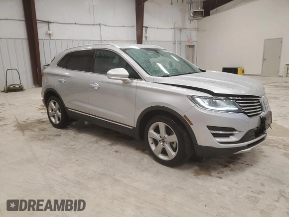 2018 Lincoln MKC Premiere with VIN 5LMCJ1C90JUL07472, listed as a Copart auction lot 50595015 with 74,989 mi miles and Salvage Title. Bid and sale history available at DreamBid. Image 4.