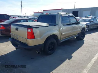 2001 Ford Explorer Sport Trac z VIN 1FMZU77E41UA58737, wystawiony jako IAAI lot #42099243 z przebiegiem 203 593 mil mil oraz . Historia ofert i sprzedaży dostępna na DreamBid. Obrazek 4.