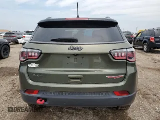2018 Jeep Compass Trailhawk z VIN 3C4NJDDB4JT307441, wystawiony jako Copart lot #58485585 z przebiegiem 158 871 mil mil oraz Szkoda całkowita • Salvage title. Historia ofert i sprzedaży dostępna na DreamBid. Obrazek 6.