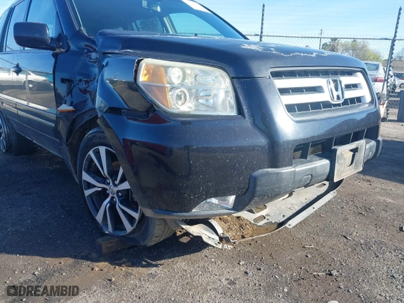 2006 Honda Pilot EX-L with VIN 5FNYF28586B037160, listed as a IAAI auction lot 41798991 with 207,486 mi miles. Bid and sale history available at carsss.com. Image 6.