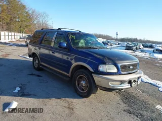 1997 Ford Expedition XLT z VIN 1FMFU18L0VLA33553, wystawiony jako IAAI lot #41241327 z przebiegiem 277 016 mil mil oraz . Historia ofert i sprzedaży dostępna na DreamBid. Obrazek 1.