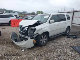 2012 Honda Pilot Touring z VIN 5FNYF4H93CB030515, wystawiony jako IAAI lot #41936563 z przebiegiem Nie podano mil oraz . Historia ofert i sprzedaży dostępna na DreamBid. Obrazek 2.