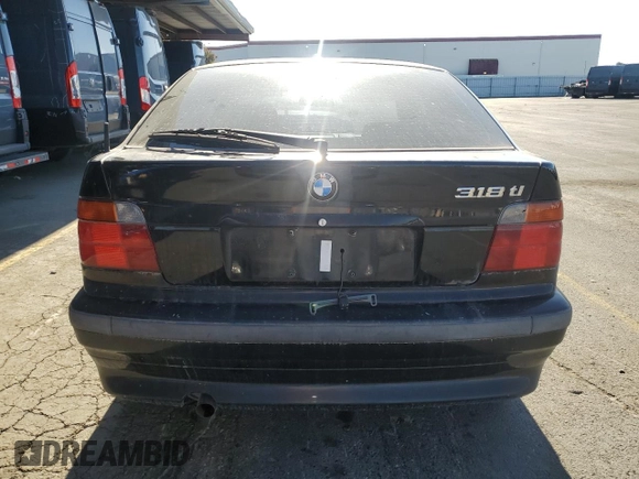 1997 BMW 3 Series 318tiA with VIN WBACG8326VAU38752, listed as a Copart auction lot 79974764 with 169,444 mi miles and Clean Title. Bid and sale history available at carsss.com. Image 6.
