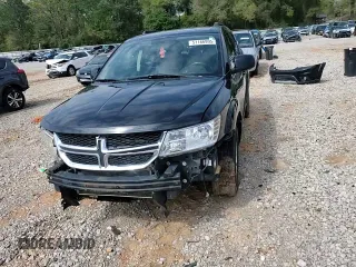 2014 Dodge Journey SXT z VIN 3C4PDDBG2ET242867, wystawiony jako Copart lot #51166995 z przebiegiem 208 568 mil mil oraz Szkoda całkowita • Salvage title. Historia ofert i sprzedaży dostępna na DreamBid. Obrazek 12.