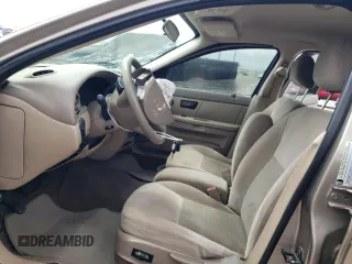 2005 Ford Taurus SE with VIN 1FAFP53205A252967, listed as a Copart auction lot 58449495 with Not provided miles and Salvage title. Bid and sale history available at DreamBid. Image 7.