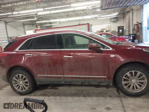 2017 Cadillac XT5 Luxury AWD with VIN 1GYKNDRS4HZ257413, listed as a IAAI auction lot 41537197 with 124,184 mi miles and . Bid and sale history available at DreamBid. Image 13.