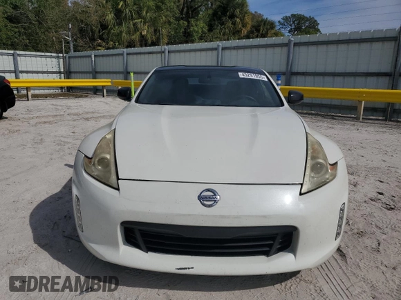 2016 Nissan 370Z z VIN JN1AZ4EH3GM931338, wystawiony jako Copart lot #43291955 z przebiegiem 69 843 mil mil oraz Szkoda całkowita • Salvage title. Historia ofert i sprzedaży dostępna na DreamBid. Obrazek 5.