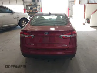 2019 Ford Fusion Hybrid SE with VIN 3FA6P0LUXKR205712, listed as a IAAI auction lot 41267049 with 124,687 mi miles. Bid and sale history available at carsss.com. Image 16.