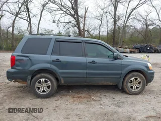 2005 Honda Pilot EX-L with VIN 5FNYF18535B011199, listed as a IAAI auction lot 41802730 with 298,903 mi miles. Bid and sale history available at carsss.com. Image 13.