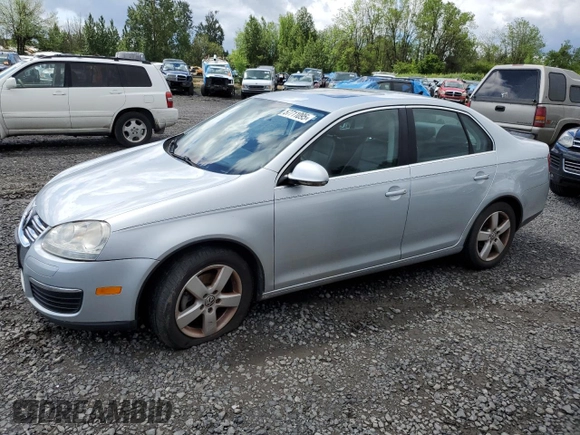 2009 Volkswagen Jetta SE with VIN 3VWRM71K99M156016, listed as a Copart auction lot 57711095 with 206,869 mi miles and Clean title. Bid and sale history available at DreamBid. Image 1.