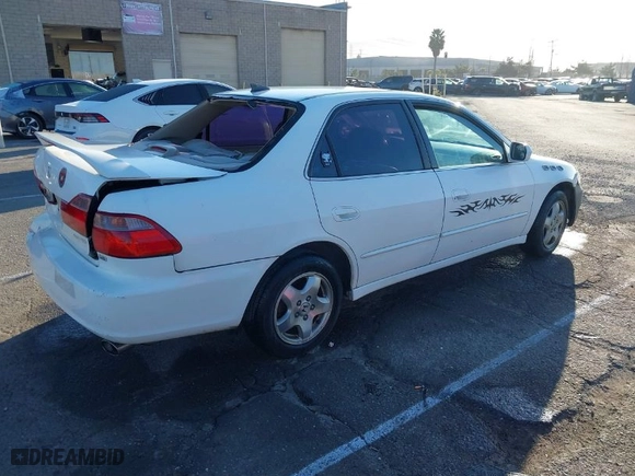 1999 Honda Accord Sdn EX with VIN 1HGCG1659XA049897, listed as a IAAI auction lot 41674942 with 194878 miles. Bid and sale history available at carsss.com. Image 4.