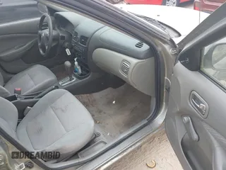 2006 Nissan Sentra S z VIN 3N1CB51D66L496829, wystawiony jako IAAI lot #42107673 z przebiegiem 118 671 mil mil oraz . Historia ofert i sprzedaży dostępna na DreamBid. Obrazek 5.