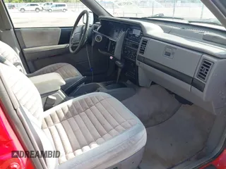 1995 Jeep Grand Cherokee Laredo with VIN 1J4FX58S9SC686074, listed as a IAAI auction lot 42451786 with 82,249 mi miles and . Bid and sale history available at DreamBid. Image 5.