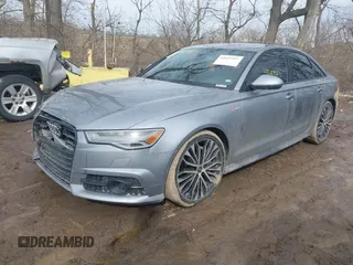 2017 Audi A6 Premium Plus z VIN WAUF2AFC7HN007745, wystawiony jako IAAI lot #41647523 z przebiegiem 119 837 mil mil oraz . Historia ofert i sprzedaży dostępna na DreamBid. Obrazek 17.