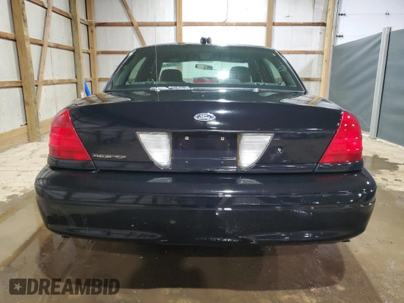 2006 Ford Police Interceptor with VIN 2FAFP71W16X144089, listed as a Copart auction lot 44249135 with 203,859 mi miles and Clean title. Bid and sale history available at DreamBid. Image 6.