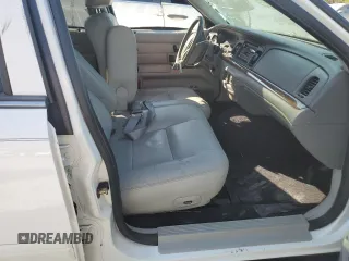2004 Ford Crown Victoria LX z VIN 2FDFP74W34X164453, wystawiony jako Copart lot #75922204 z przebiegiem 103 546 mil mil oraz Szkoda całkowita • Salvage title. Historia ofert i sprzedaży dostępna na DreamBid. Obrazek 7.