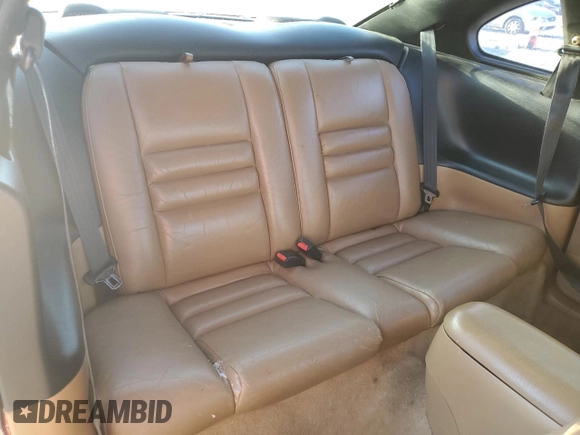 1996 Ford Mustang GT z VIN 1FALP42X0TF168223, wystawiony jako Copart lot #46351085 z przebiegiem 121 657 mil mil oraz Szkoda całkowita • Salvage title. Historia ofert i sprzedaży dostępna na DreamBid. Obrazek 10.