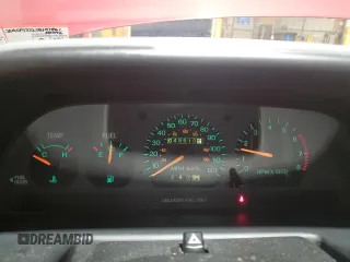1995 Ford Escort z VIN 3FASP13J2SR157861, wystawiony jako Copart lot #82770964 z przebiegiem 48 610 mil mil oraz Szkoda całkowita • Salvage title. Historia ofert i sprzedaży dostępna na DreamBid. Obrazek 9.