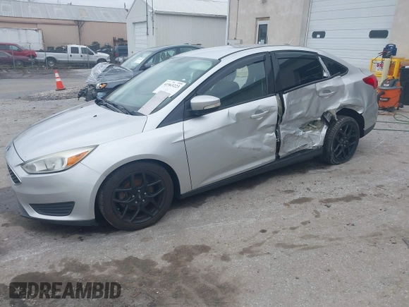 2015 Ford Focus SE with VIN 1FADP3F29FL258781, listed as a IAAI auction lot 41963223 with 121,286 mi miles and . Bid and sale history available at DreamBid. Image 2.