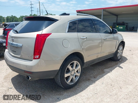 2012 Cadillac SRX Premium Collection with VIN 3GYFNCE30CS608477, listed as a IAAI auction lot 42120676 with 183,619 mi miles and . Bid and sale history available at DreamBid. Image 4.