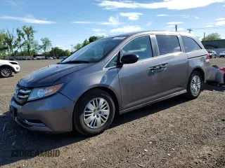 2014 Honda Odyssey LX z VIN 5FNRL5H21EB034703, wystawiony jako Copart lot #57258385 z przebiegiem 118 393 mil mil oraz Szkoda całkowita • Salvage title. Historia ofert i sprzedaży dostępna na DreamBid. Obrazek 1.