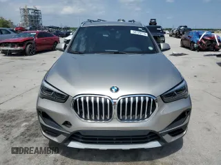 2021 BMW X1 sDrive28i with VIN WBXJG7C08M5S33866, listed as a Copart auction lot 54729715 with Not Provided miles and Salvage Title. Bid and sale history available at DreamBid. Image 5.