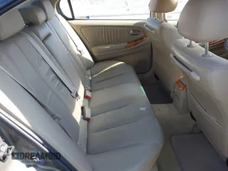 2003 Infiniti I35 Luxury with VIN JNKDA31A23T104434, listed as a IAAI auction lot 41821043 with 146,903 mi miles. Bid and sale history available at carsss.com. Image 8.