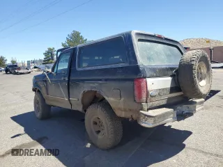 1996 Ford Bronco Custom with VIN 1FMEU15H6TLB18163, listed as a Copart auction lot 51802494 with 151,134 mi miles and Salvage Title. Bid and sale history available at DreamBid. Image 2.