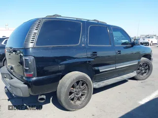 2004 Chevrolet Tahoe LS with VIN 1GNEC13T94J331286, listed as a IAAI auction lot 40691697 with 211,544 mi miles. Bid and sale history available at carsss.com. Image 13.