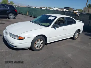 2003 Oldsmobile Alero GL1 z VIN 1G3NL52F53C323443, wystawiony jako IAAI lot #42271207 z przebiegiem 138 180 mil mil oraz . Historia ofert i sprzedaży dostępna na DreamBid. Obrazek 12.