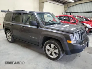 2015 Jeep Patriot Latitude with VIN 1C4NJPFB3FD353256, listed as a Copart auction lot 43928265 with 153,574 mi miles and Salvage Title. Bid and sale history available at DreamBid. Image 4.