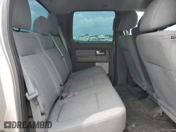 2012 Ford F-150 XL z VIN 1FTFW1CT7CFC31323, wystawiony jako Copart lot #53886455 z przebiegiem 150 947 mil mil oraz Szkody całkowita. Historia ofert i sprzedaży dostępna na DreamBid. Obrazek 10.