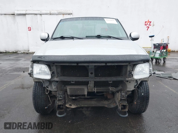 2002 Ford F-150 XL with VIN 2FTRX18W02CA59160, listed as a IAAI auction lot 41610058 with 190,608 mi miles and . Bid and sale history available at DreamBid. Image 13.