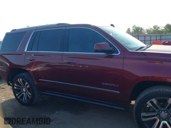 2017 GMC Yukon Denali with VIN 1GKS1CKJ4HR141145, listed as a IAAI auction lot 40799652 with 104,369 mi miles. Bid and sale history available at carsss.com. Image 12.