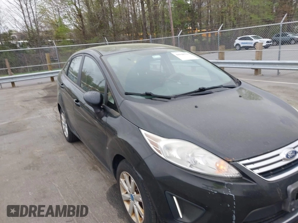 2011 Ford Fiesta SE with VIN 3FADP4BJ5BM221349, listed as a IAAI auction lot 41948737 with 216,540 mi miles. Bid and sale history available at carsss.com. Image 6.