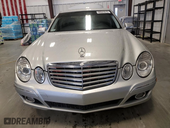2007 Mercedes-Benz E 550 with VIN WDBUF72X97B017766, listed as a Copart auction lot 48523515 with 299,578 mi miles and Salvage Title. Bid and sale history available at DreamBid. Image 5.