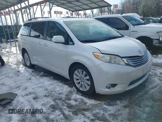 2013 Toyota Sienna XLE AAS with VIN 5TDYK3DC9DS380445, listed as a IAAI auction lot 41308312 with 174,325 mi miles and . Bid and sale history available at carsss.com. Image 1.