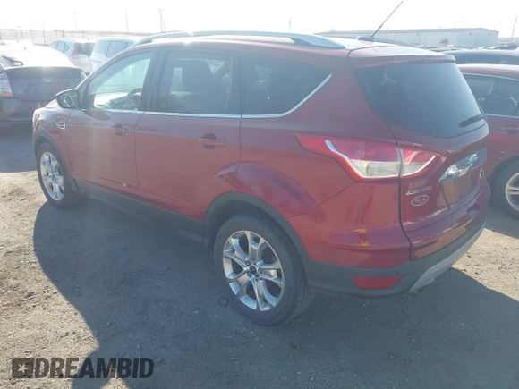 2014 Ford Escape Titanium with VIN 1FMCU9J98EUC24857, listed as a IAAI auction lot 41973037 with 160,634 mi miles. Bid and sale history available at carsss.com. Image 3.