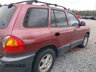 2002 Hyundai Santa Fe GLS with VIN KM8SC73D72U306997, listed as a IAAI auction lot 41519773 with 244,398 mi miles. Bid and sale history available at carsss.com. Image 16.