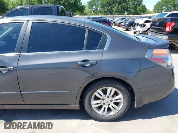 2012 Nissan Altima 2.5 with VIN 1N4AL2AP0CN566515, listed as a IAAI auction lot 41977356 with 294,729 mi miles and . Bid and sale history available at DreamBid. Image 18.