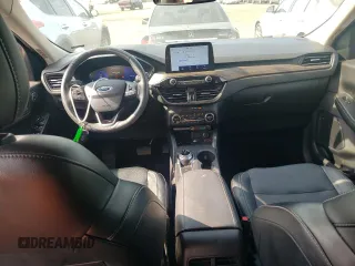2020 Ford Escape Titanium z VIN 1FMCU9J97LUB25055, wystawiony jako Copart lot #60326945 z przebiegiem 78 711 mil mil oraz Szkoda całkowita • Salvage title. Historia ofert i sprzedaży dostępna na DreamBid. Obrazek 8.