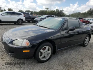 1997 Honda del Sol Si with VIN JHMEH6263VS001799, listed as a Copart auction lot 73735194 with 52,448 mi miles and Salvage Title. Bid and sale history available at carsss.com. Image 1.