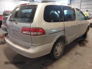 2003 Toyota Sienna LE with VIN 4T3ZF13C53U510457, listed as a IAAI auction lot 41642470 with 219,515 mi miles. Bid and sale history available at carsss.com. Image 4.