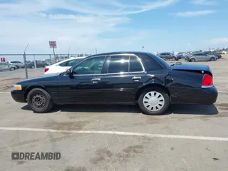 2008 Ford Police Interceptor z VIN 2FAFP71V98X160096, wystawiony jako IAAI lot #42041147 z przebiegiem 223 577 mil mil oraz . Historia ofert i sprzedaży dostępna na DreamBid. Obrazek 14.