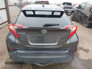 2020 Toyota C-HR LE z VIN JTNKHMBX0L1073916, wystawiony jako IAAI lot #41720784 z przebiegiem 96 730 mil mil oraz . Historia ofert i sprzedaży dostępna na DreamBid. Obrazek 16.